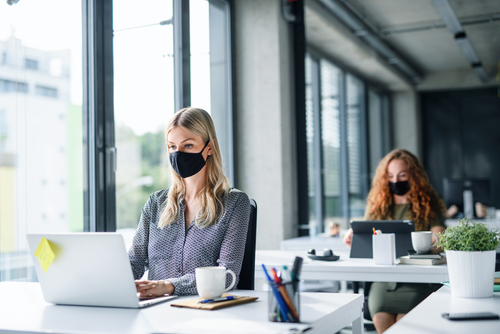 Young,People,With,Face,Masks,Back,At,Work,Or,School