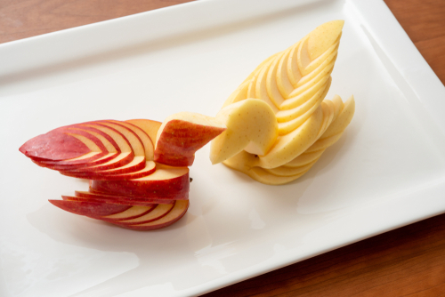Swan,Shaped,Carving,Made,Of,Apples.