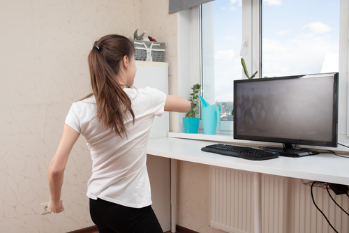 Dancing,At,Home.,Young,Woman,Doing,Exercises,Looking,At,The