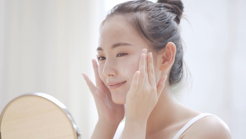 Young,Woman,Doing,Skin,Care