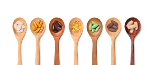 Top,View,Variety,Of,Vitamin,And,Mineral,Pills,In,Wooden
