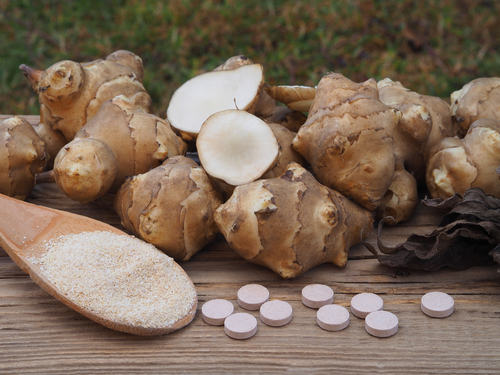 Fruits,Of,The,Jerusalem,Artichoke,Plant,,Pills,And,Natural,Powder