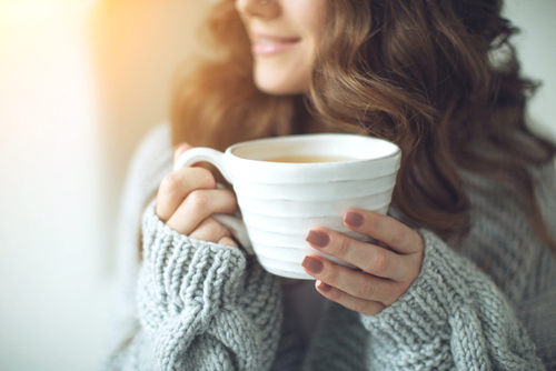 Close-up,Of,Female,Hands,With,A,Mug,Of,Drink.,Beautiful
