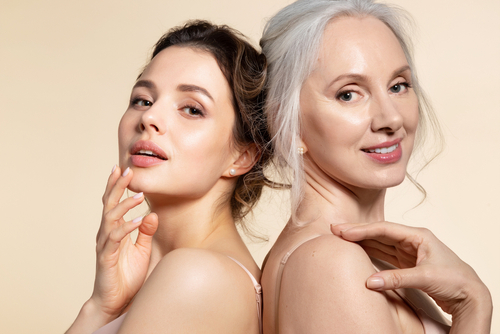 Two,Beautiful,Different,Age,Woman,With,Perfect,Skin,Headshot,Portrait.