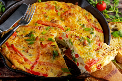 Frittata,Made,Of,Eggs,,Potato,,Bacon,,Paprika,,Parsley,,Green,Peas,