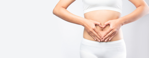 Close,Up,Healthy,Stomach,Ache,Woman,Hands,Made,Heart,On