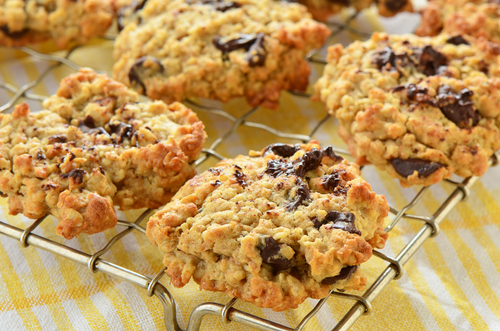 Fresh,Baked,Chocolate,Chip,Oatmeal,Cookies,On,Metal,Cooling,Rack