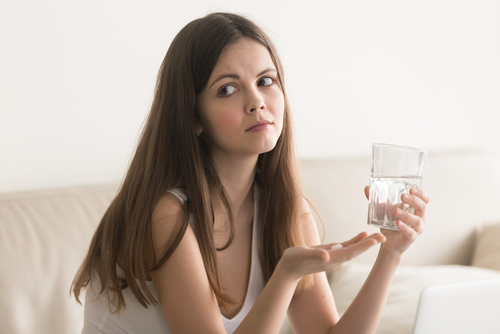 Doubtful,Young,Woman,Feels,Unsure,Taking,Medicine,,Depressed,Unhealthy,Girl