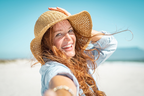Portrait,Of,Beautiful,Mature,Woman,In,Casual,Wearing,Straw,Hat