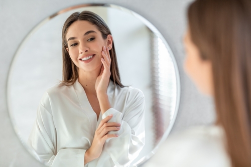Self-care,Concept.,Portrait,Of,Attractive,Young,Female,Looking,At,Mirror,