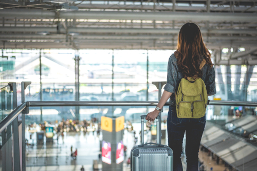 Female,Traveler,Waiting,For,Take,Off,Flight,In,High,Ground