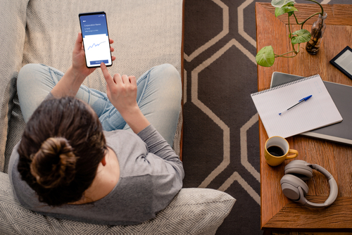 Woman,Using,Investment,Mobile,App