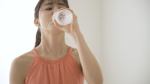 A,Young,Woman,Is,Hydrating