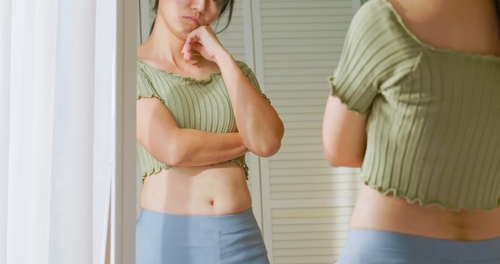 Close,Up,View,-,Asian,Woman,Standing,In,Front,Of