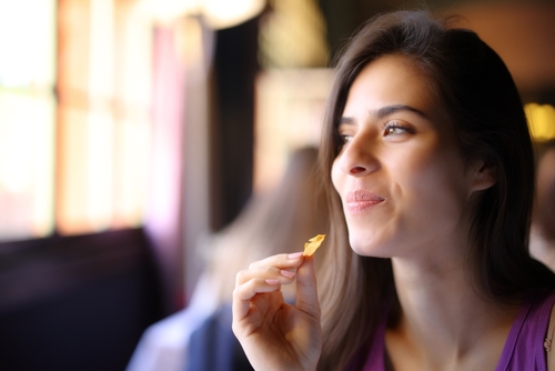 Happy,Restaurant,Customer,Eating,Chips,Looking,Away
